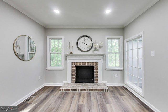 8102 Aspenwood Way, Jessup, MD 20794 - unfurnished living room featuring wood finished floors, a fireplace, and recessed lighting