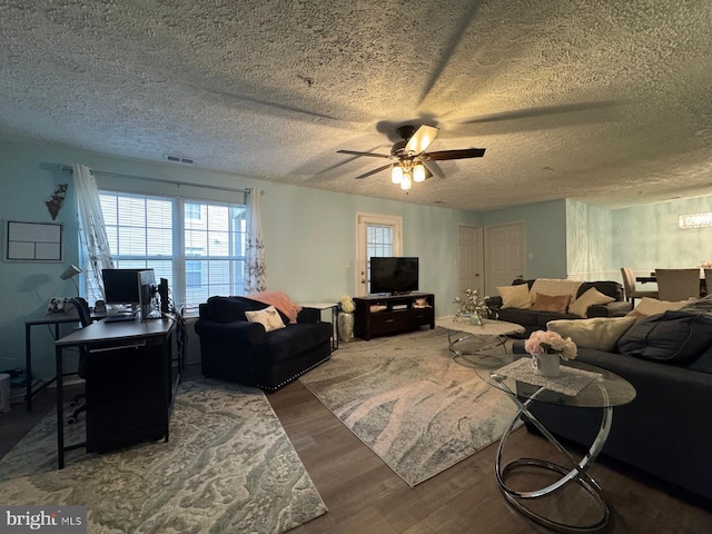 3712 Excalibur Ct Unit 202, Bowie, MD 20716 - living area with wood finished floors, ceiling fan, a textured ceiling, and a desk