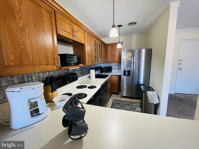 46 Township Line Rd Unit 215, Elkins Park, PA 19027 - kitchen featuring black appliances, tasteful backsplash, brown cabinetry, glass insert cabinets, and crown molding