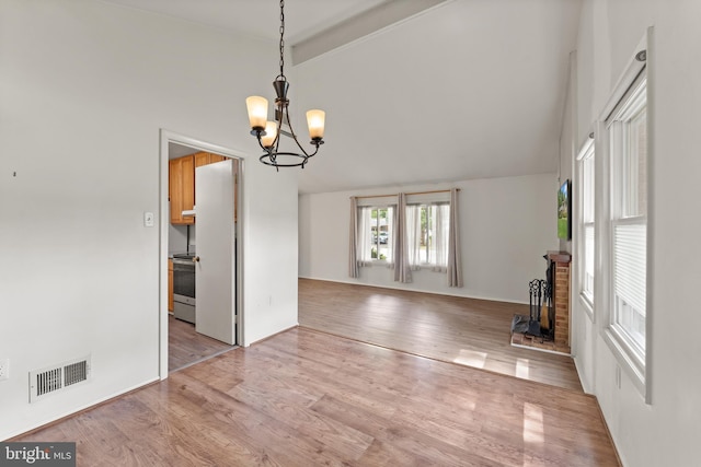 402 Sugarland Run Dr, Sterling, VA 20164 - unfurnished dining area with a chandelier, high vaulted ceiling, and wood finished floors