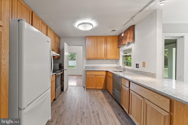 402 Sugarland Run Dr, Sterling, VA 20164 - kitchen with appliances with stainless steel finishes, healthy amount of natural light, rail lighting, and light wood finished floors