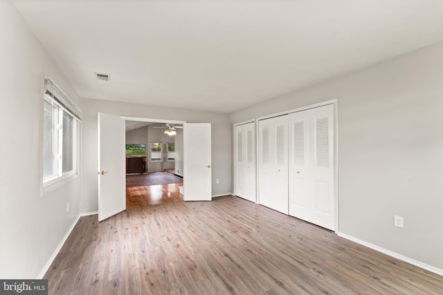402 Sugarland Run Dr, Sterling, VA 20164 - unfurnished bedroom with wood finished floors and baseboards