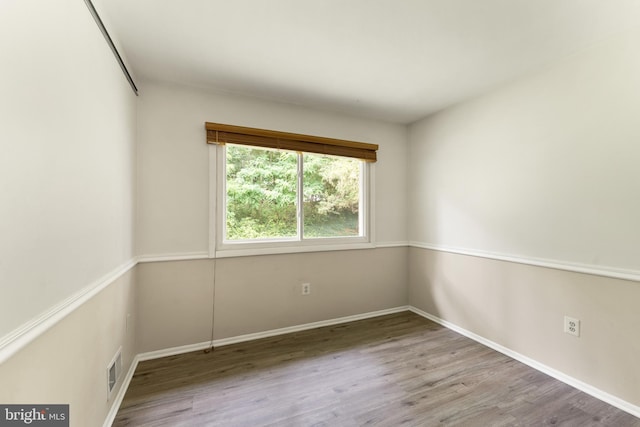 402 Sugarland Run Dr, Sterling, VA 20164 - empty room with wood finished floors and baseboards