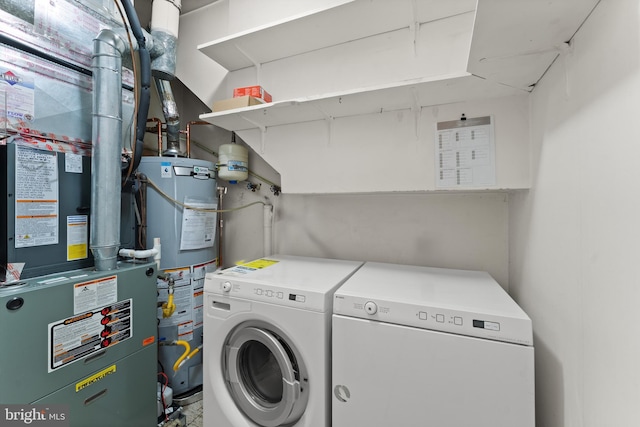 402 Sugarland Run Dr, Sterling, VA 20164 - laundry area featuring gas water heater, washer and dryer, and heating unit