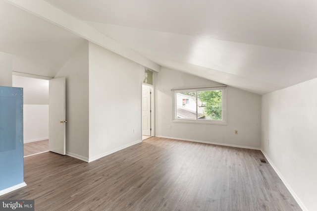 402 Sugarland Run Dr, Sterling, VA 20164 - additional living space with lofted ceiling and wood finished floors
