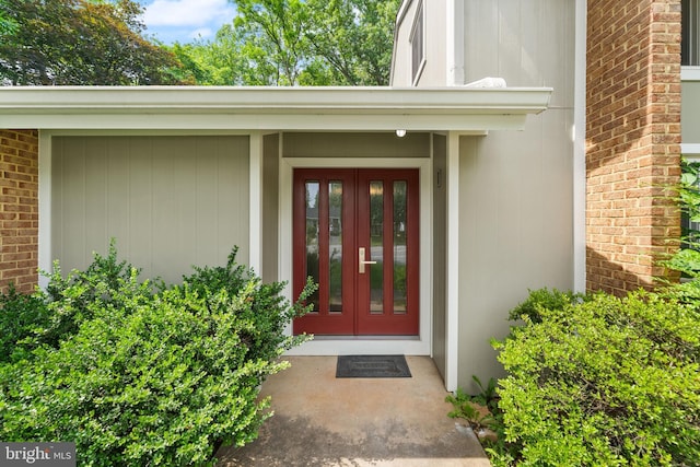 402 Sugarland Run Dr, Sterling, VA 20164 - entrance to property with french doors and brick siding