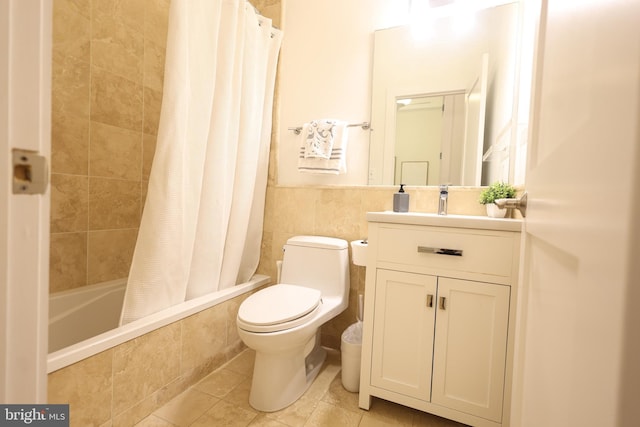 1622 19th St NW Unit 2, Washington, DC 20009 - full bath with tiled shower / bath, vanity, tile patterned floors, and tile walls
