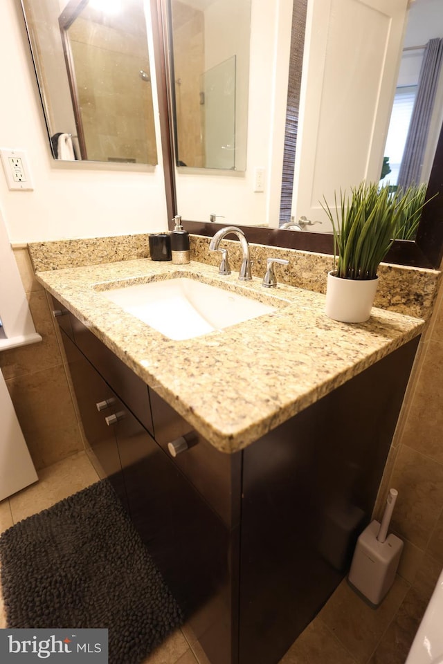 1622 19th St NW Unit 2, Washington, DC 20009 - bathroom with vanity and tile patterned floors