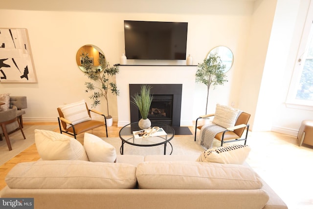 1622 19th St NW Unit 2, Washington, DC 20009 - living area with a fireplace with flush hearth and wood finished floors