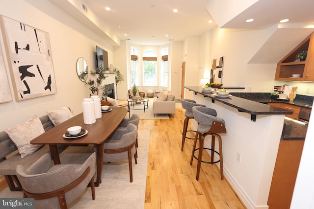 1622 19th St NW Unit 2, Washington, DC 20009 - dining room with light wood-style floors and recessed lighting