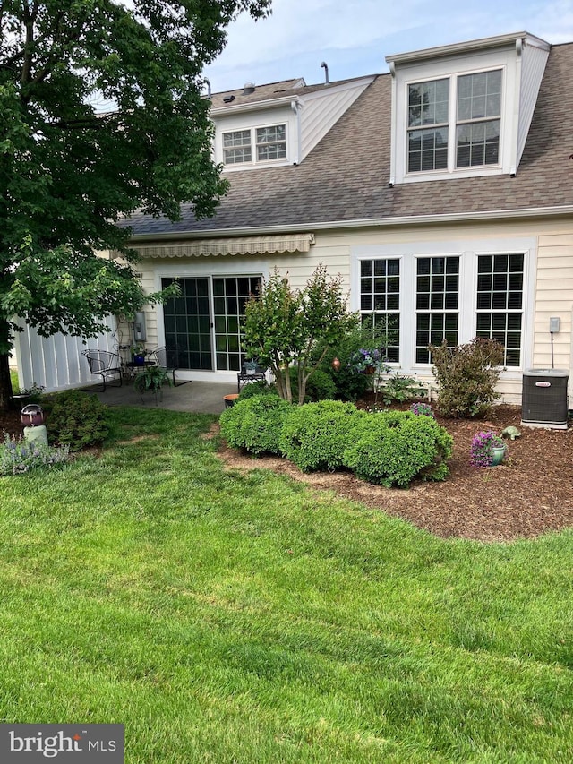 44497 Maltese Falcon Sq, Ashburn, VA 20147 - back of house featuring a patio, a lawn, french doors, and roof with shingles