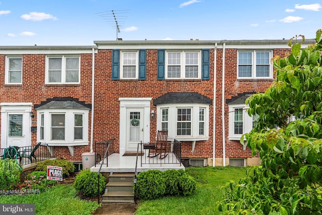 222 Blakeney Rd, Baltimore, MD 21228 - view of property featuring brick siding