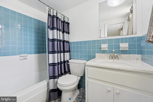 48 Llanfair Rd Unit 1, Ardmore, PA 19003 - full bath with tile walls, vanity, shower / bath combo, tile patterned flooring, and wainscoting