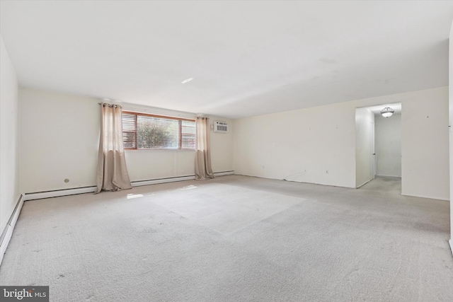 48 Llanfair Rd Unit 1, Ardmore, PA 19003 - unfurnished room with a wall unit AC, baseboard heating, carpet, and a baseboard heating unit
