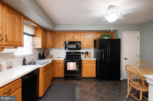 1043 Fredrick Blvd, Reading, PA 19605 - kitchen featuring black appliances, decorative backsplash, light countertops, ceiling fan, and brown cabinets