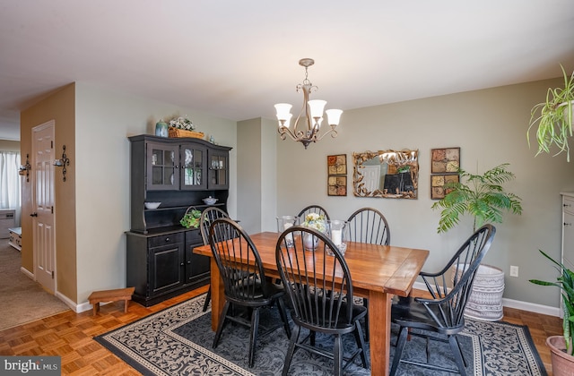 1043 Fredrick Blvd, Reading, PA 19605 - dining area featuring a chandelier and baseboards