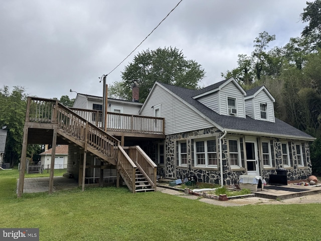 3236 George St, Baltimore, MD 21220 - rear view of house featuring a deck, stone siding, stairs, a lawn, and roof with shingles
