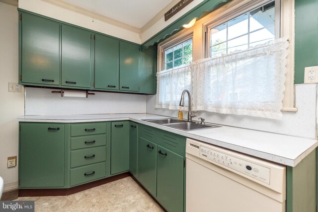 321 Willow Rd, Hellertown, PA 18055 - kitchen with dishwasher, light countertops, crown molding, and green cabinetry