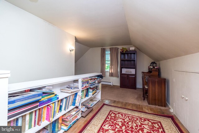 321 Willow Rd, Hellertown, PA 18055 - living area featuring a baseboard heating unit and lofted ceiling