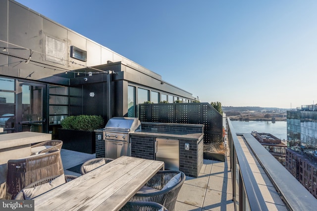 1300 4th St SE Unit 715, Washington, DC 20003 - view of patio / terrace with outdoor dining area, area for grilling, and a water view