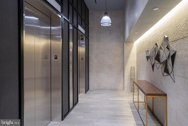 1300 4th St SE Unit 715, Washington, DC 20003 - hall with elevator and light wood-style floors