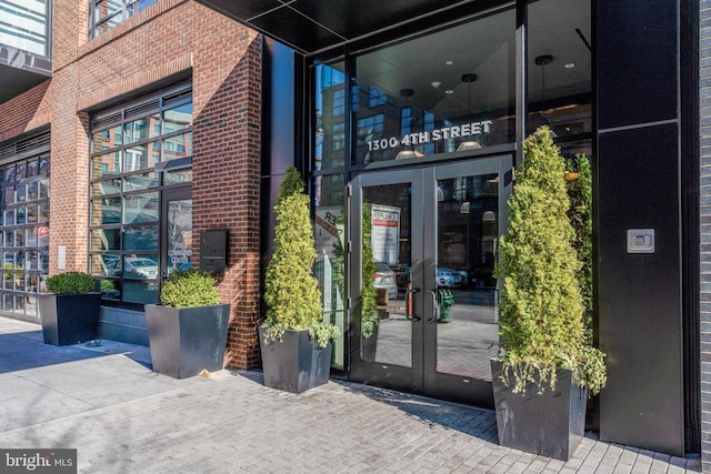 1300 4th St SE Unit 715, Washington, DC 20003 - property entrance featuring french doors and brick siding
