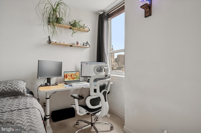 1100 Vine St Unit 1409, Philadelphia, PA 19107 - carpeted bedroom with baseboards and a desk