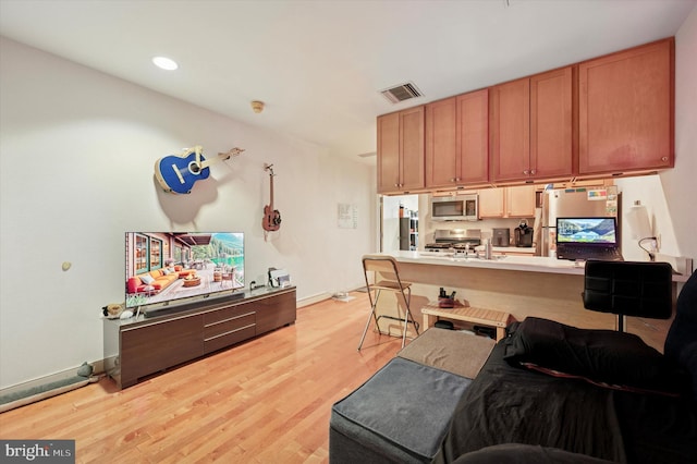 1100 Vine St Unit 1409, Philadelphia, PA 19107 - living room featuring light wood finished floors and recessed lighting