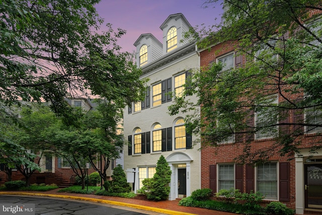 8878 Ashgrove House Ln, Vienna, VA 22182 - colonial-style house featuring brick siding