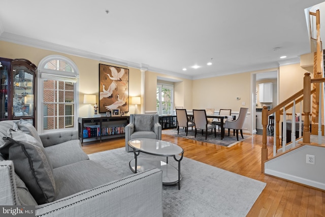 8878 Ashgrove House Ln, Vienna, VA 22182 - living room featuring ornamental molding, stairs, hardwood / wood-style floors, and recessed lighting