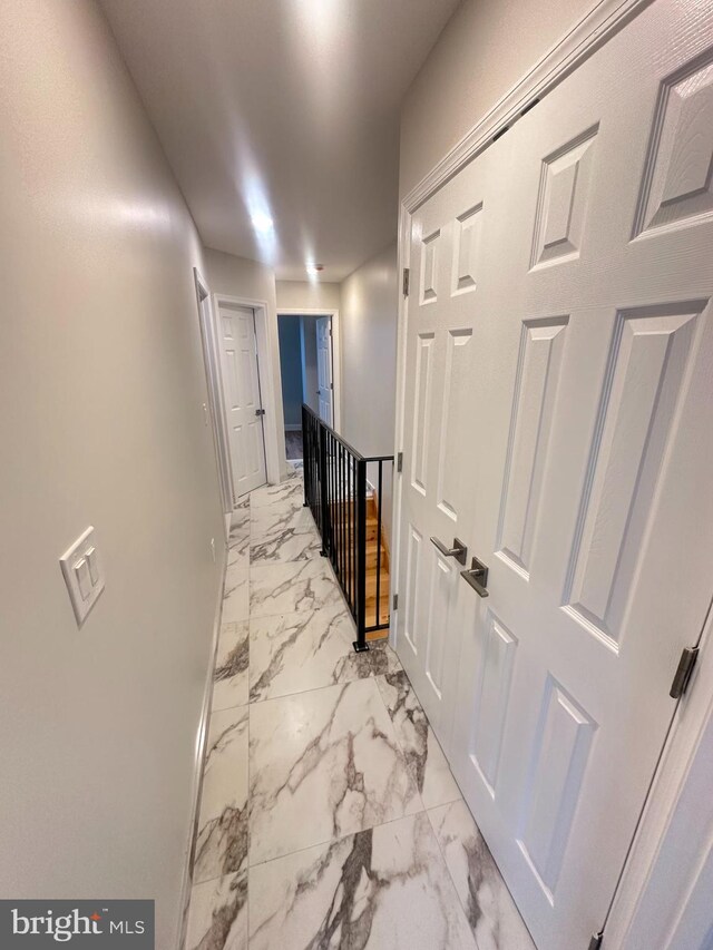 205 W Wishart St, Philadelphia, PA 19133 - corridor featuring marble finish flooring and an upstairs landing