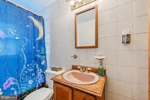 110 S Marlyn Ave, Essex, MD 21221 - bathroom featuring tile walls, vanity, decorative backsplash, and a shower with curtain