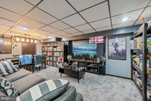 110 S Marlyn Ave, Essex, MD 21221 - carpeted living room with a paneled ceiling and baseboards