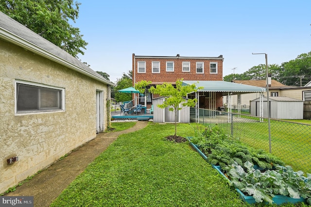 110 S Marlyn Ave, Essex, MD 21221 - view of yard featuring a shed and a deck