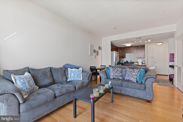 155 Potomac Psge Unit 817, Oxon Hill, MD 20745 - living area with light wood-style floors