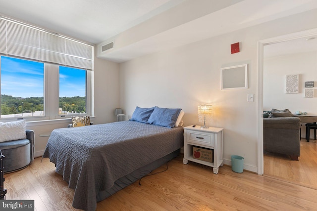 155 Potomac Psge Unit 817, Oxon Hill, MD 20745 - bedroom with light wood-style floors