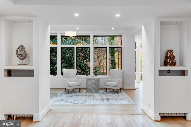 2950 Macomb St NW, Washington, DC 20008 - living area featuring hardwood / wood-style flooring, baseboards, and recessed lighting