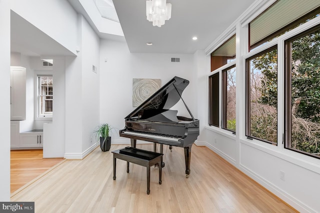 2950 Macomb St NW, Washington, DC 20008 - sitting room with light wood finished floors, healthy amount of natural light, baseboards, and recessed lighting