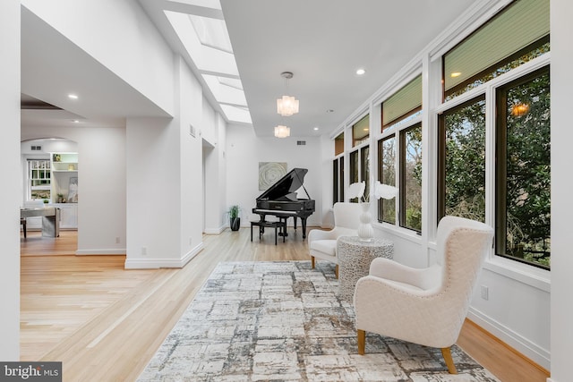 2950 Macomb St NW, Washington, DC 20008 - living area featuring healthy amount of natural light, wood finished floors, baseboards, and recessed lighting