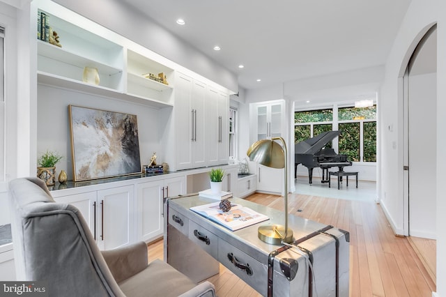 2950 Macomb St NW, Washington, DC 20008 - living room with light wood-style floors, recessed lighting, and baseboards