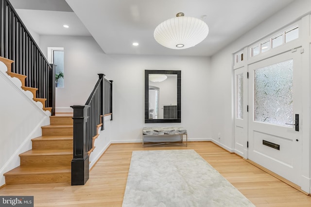 2950 Macomb St NW, Washington, DC 20008 - entrance foyer with stairs, wood finished floors, baseboards, and recessed lighting
