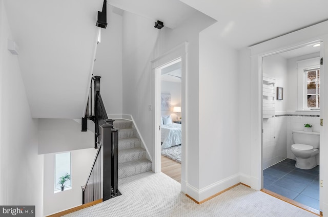 2950 Macomb St NW, Washington, DC 20008 - stairway featuring baseboards