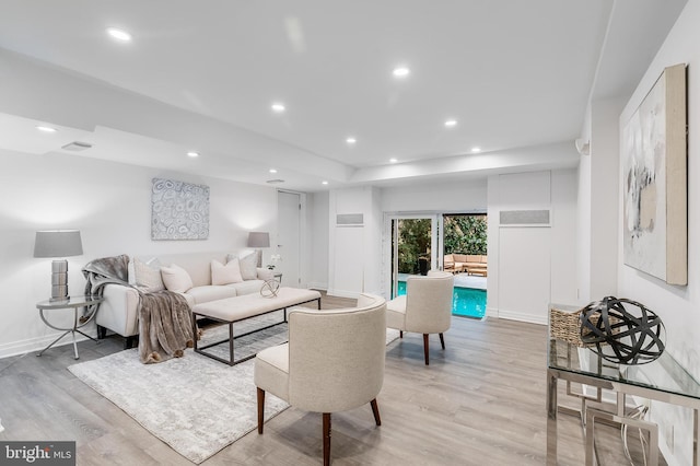 2950 Macomb St NW, Washington, DC 20008 - living area featuring light wood finished floors, recessed lighting, and baseboards