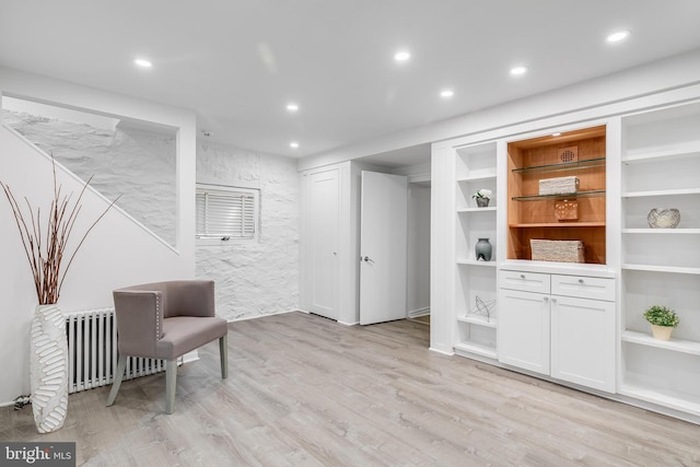 2950 Macomb St NW, Washington, DC 20008 - sitting room with radiator heating unit, light wood-type flooring, and recessed lighting