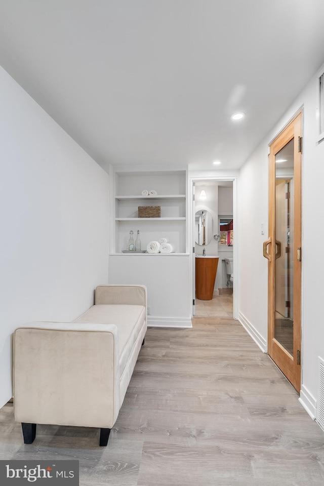 2950 Macomb St NW, Washington, DC 20008 - bedroom featuring wood finished floors, recessed lighting, and ensuite bath