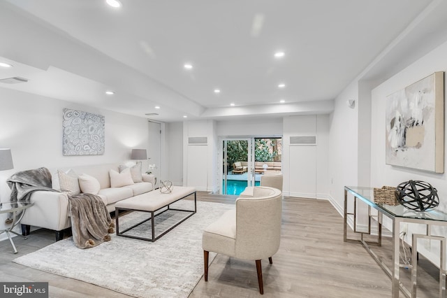 2950 Macomb St NW, Washington, DC 20008 - living area featuring wood finished floors, recessed lighting, and baseboards
