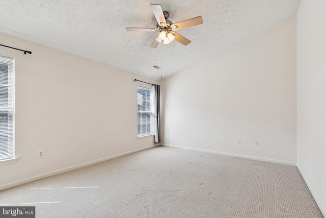 8309 Pigeon Fork Ln, Laurel, MD 20724 - carpeted spare room featuring a textured ceiling and ceiling fan