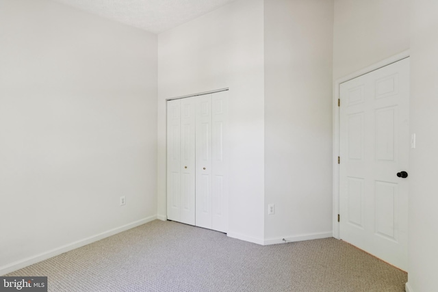 8309 Pigeon Fork Ln, Laurel, MD 20724 - unfurnished bedroom featuring carpet floors and a closet