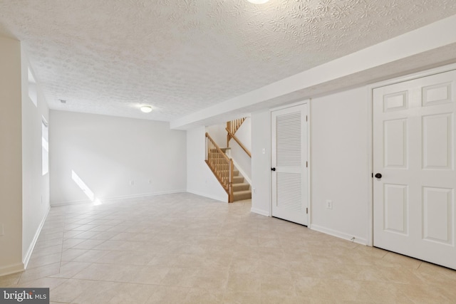 8309 Pigeon Fork Ln, Laurel, MD 20724 - basement featuring a textured ceiling and stairway