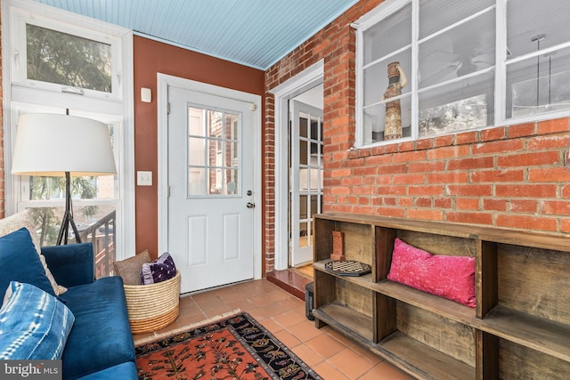 1850 Irving St NW, Washington, DC 20010 - entryway with tile patterned flooring and brick wall